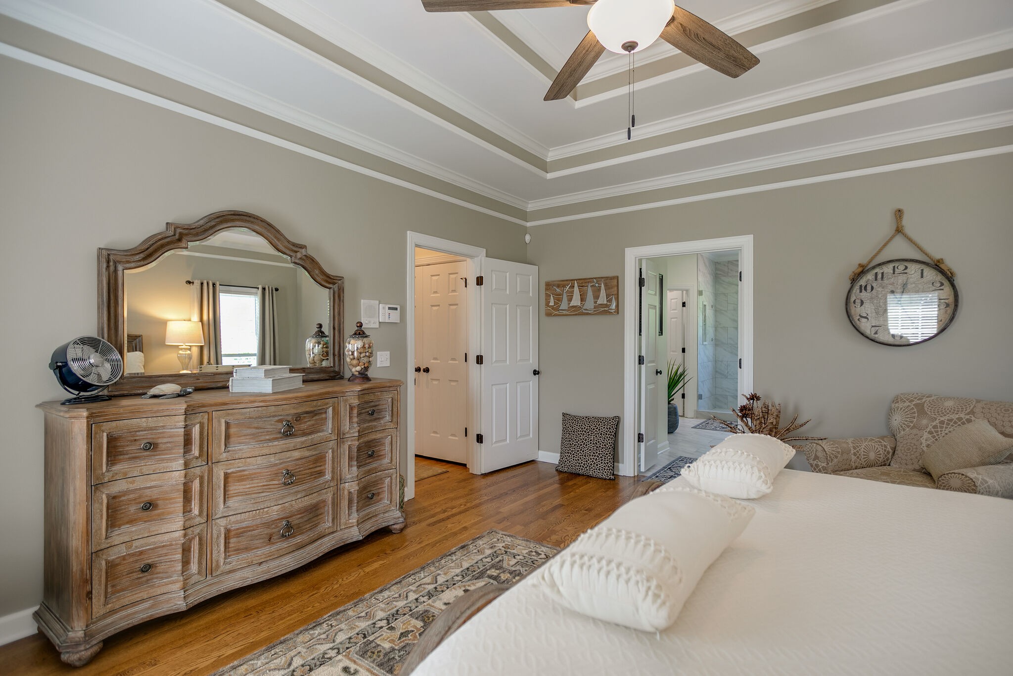 2260 Avery Court Franklin, TN 37067 - Photo 27 of 61 a bedroom with a large bed and a chandelier