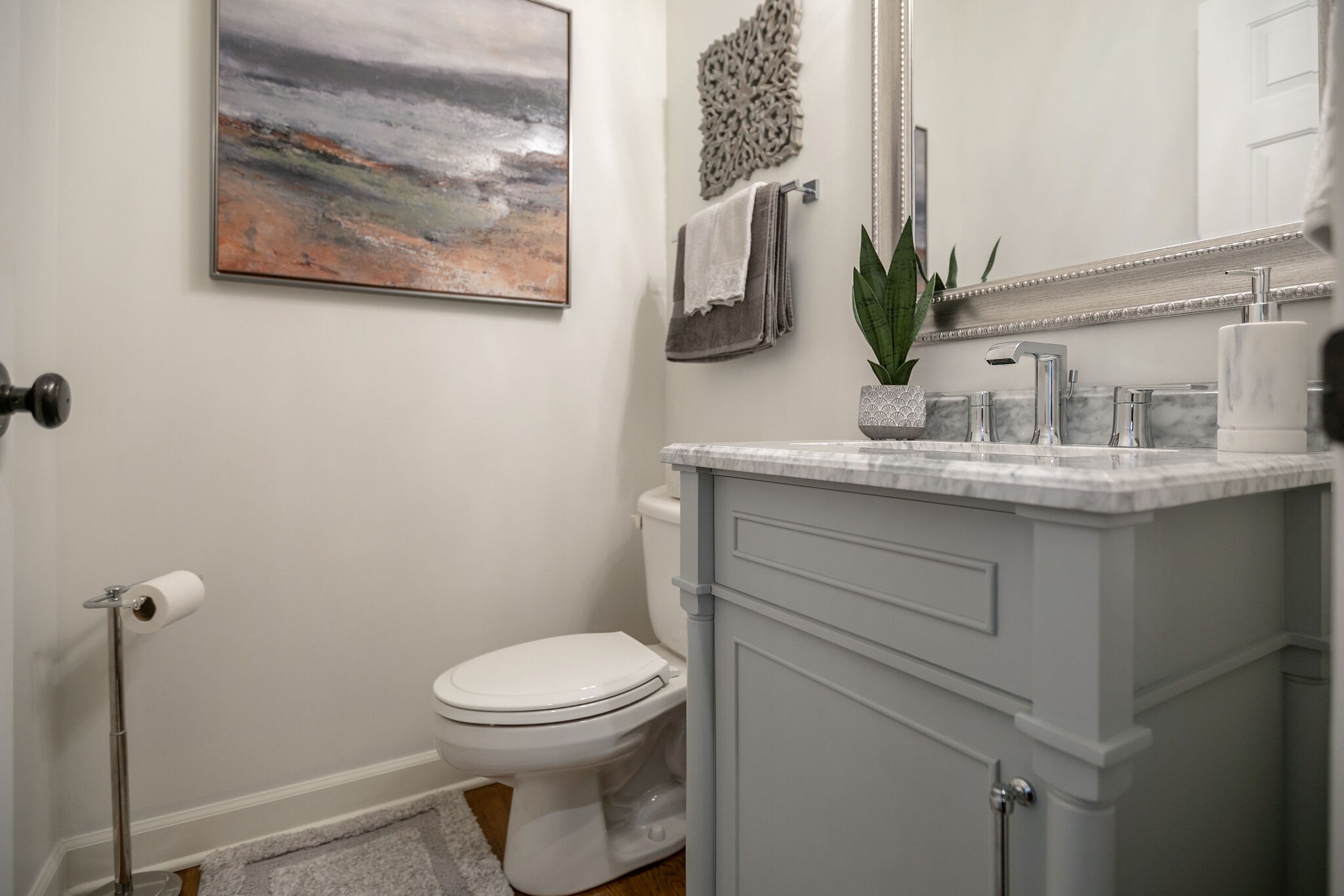 2260 Avery Court Franklin, TN 37067 - Photo 31 of 61 a bathroom with a toilet sink and mirror