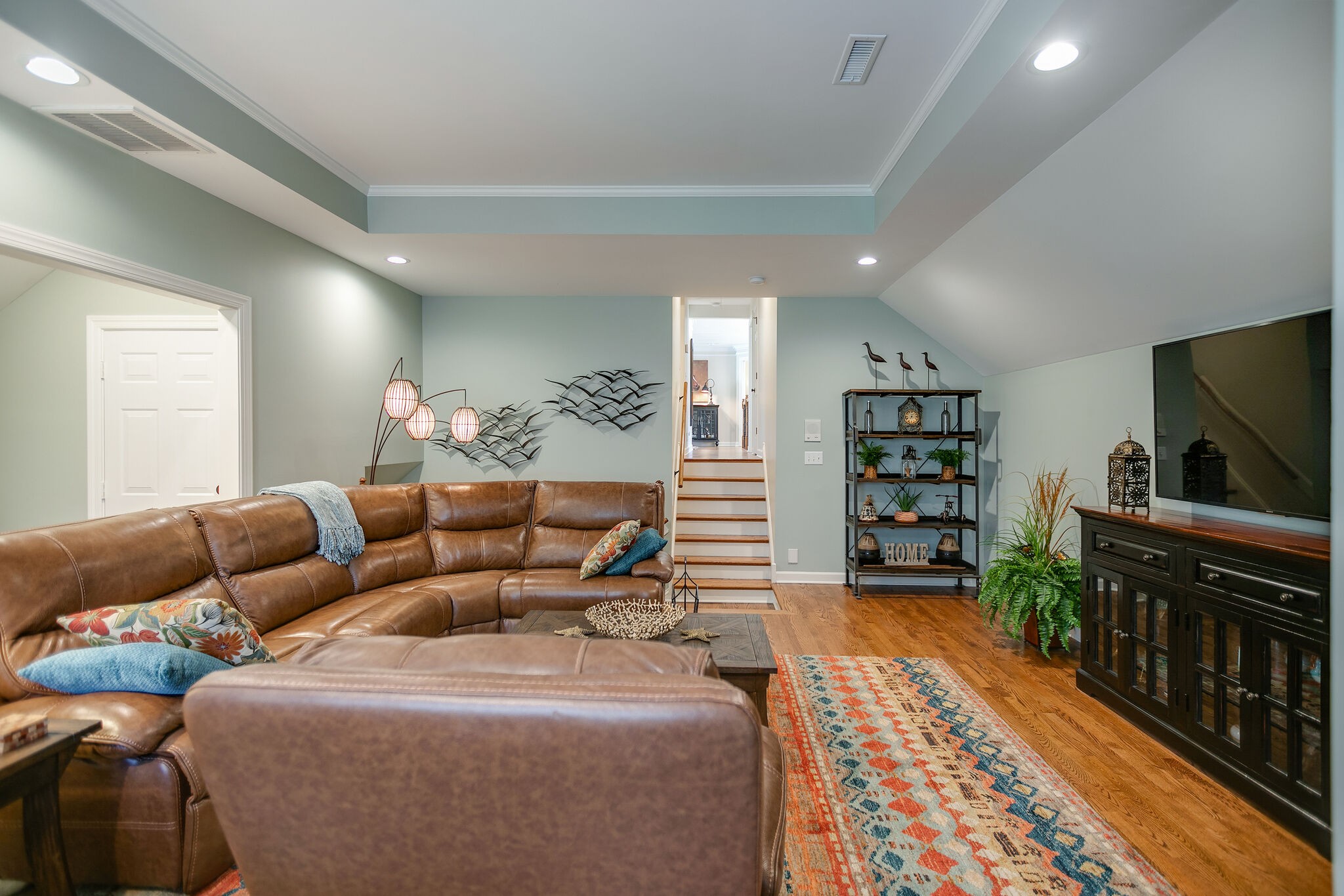2260 Avery Court Franklin, TN 37067 - Photo 34 of 61 a living room with furniture and a flat screen tv