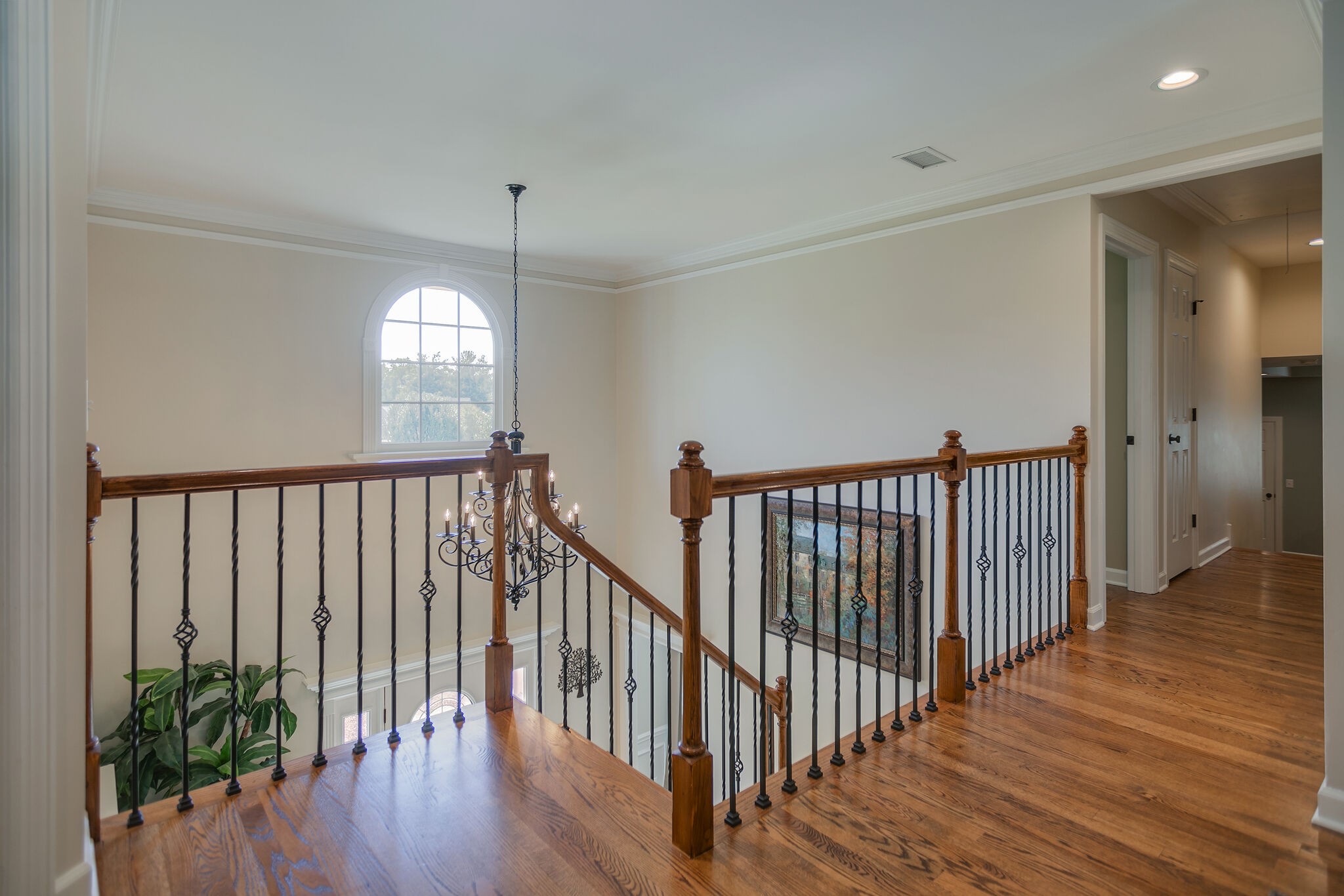 2260 Avery Court Franklin, TN 37067 - Photo 36 of 61 a view of a hallway with wooden floor and stairs
