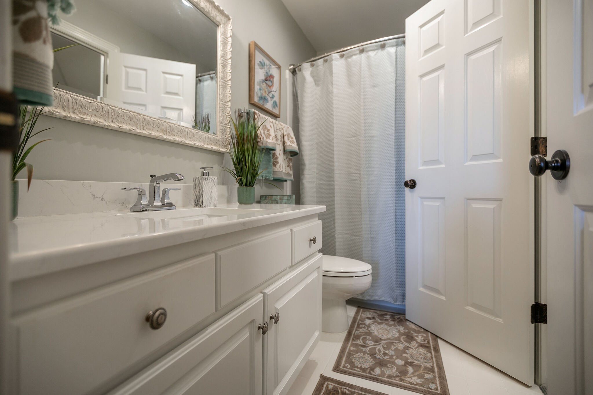2260 Avery Court Franklin, TN 37067 - Photo 40 of 61 a bathroom with a sink a toilet a shower and a mirror