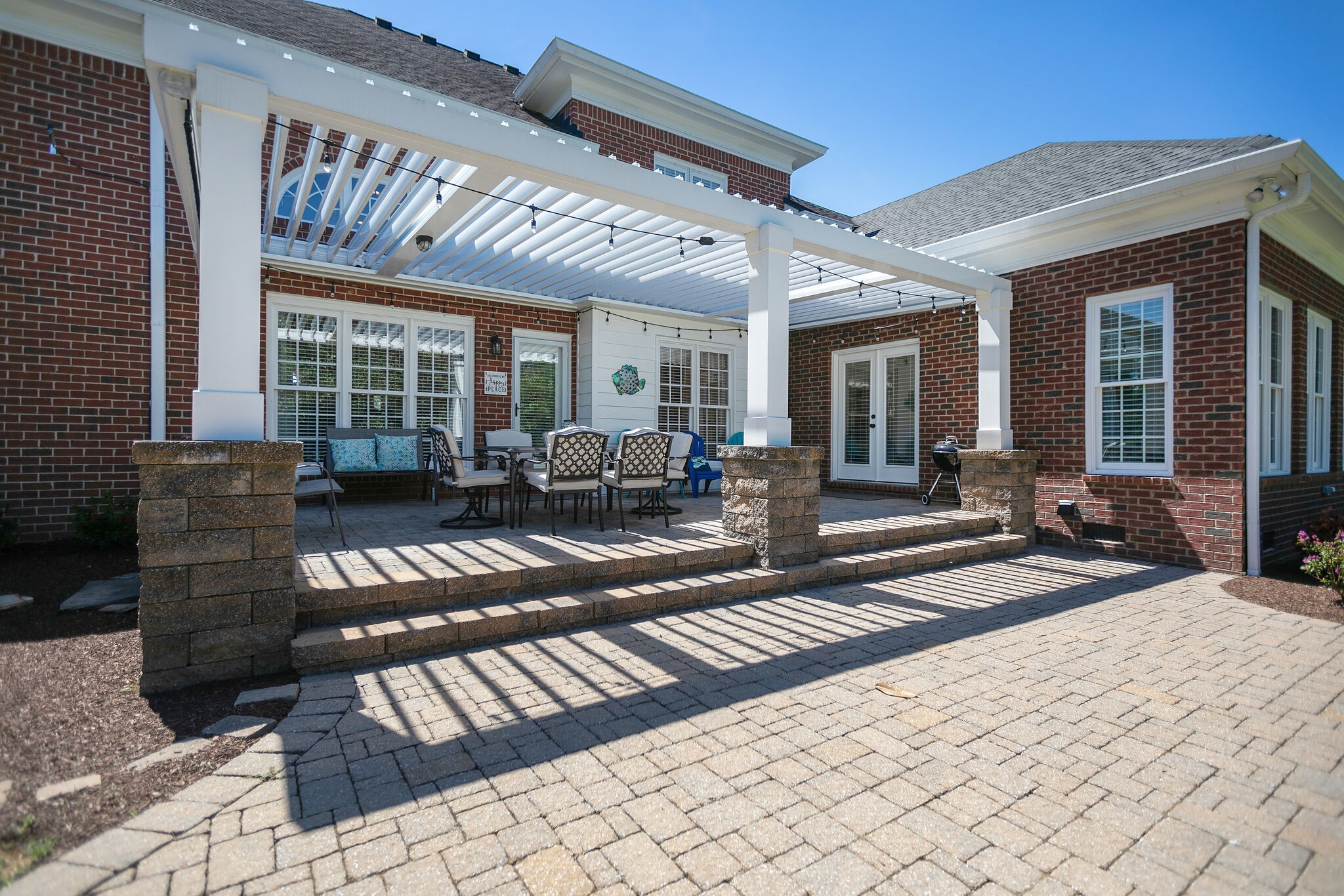 2260 Avery Court Franklin, TN 37067 - Photo 52 of 61 a view of a patio with table and chairs