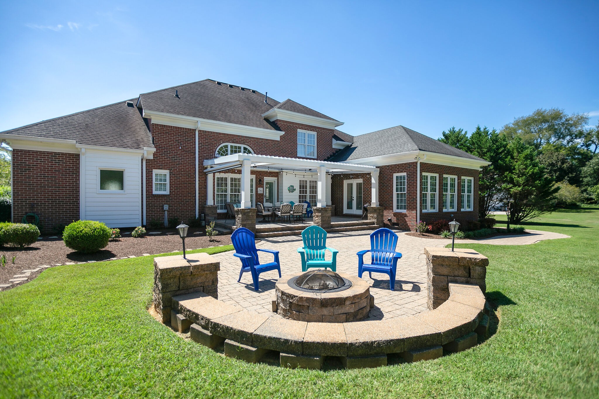 2260 Avery Court Franklin, TN 37067 - Photo 54 of 61 a front view of a house with a yard table and chairs