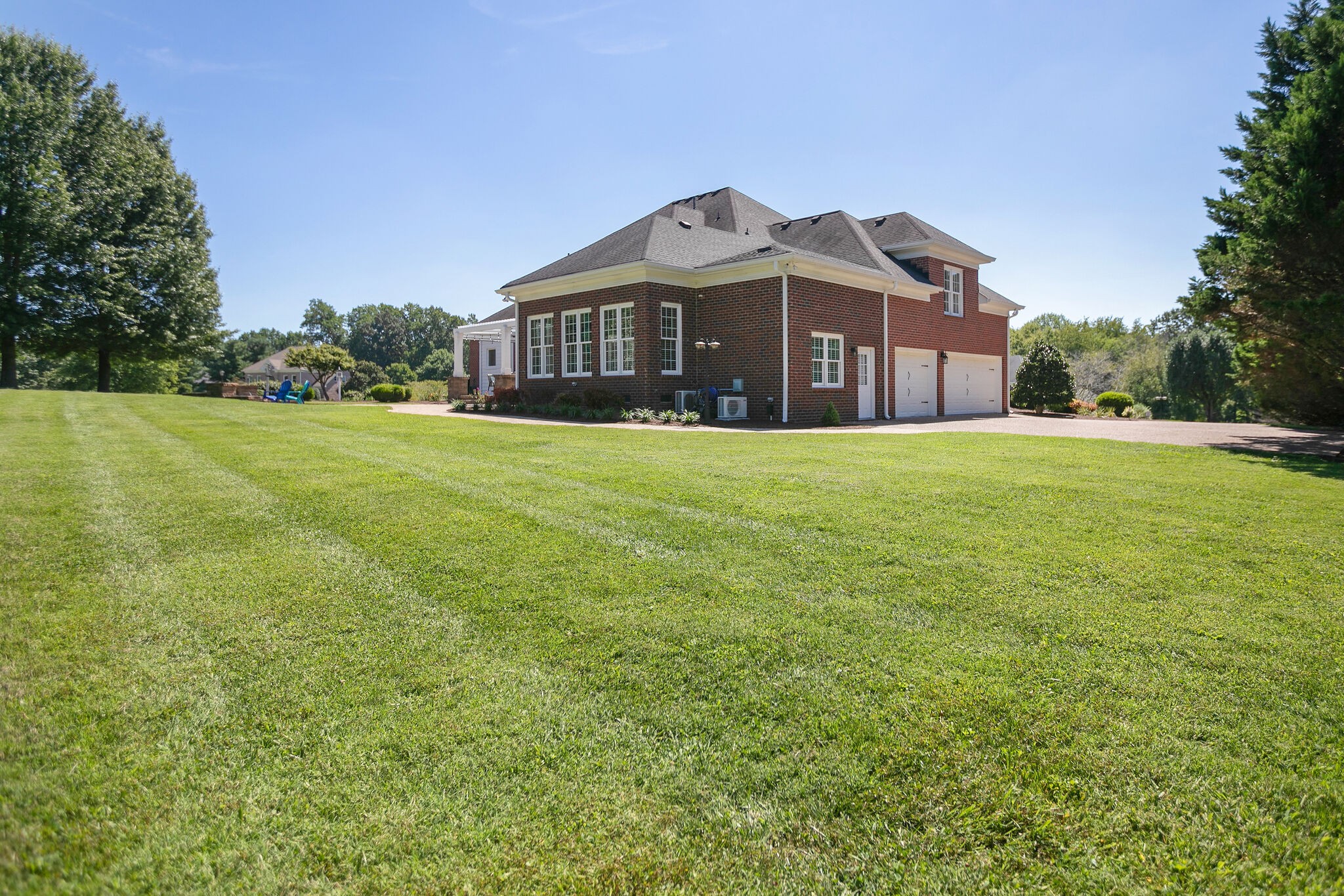 2260 Avery Court Franklin, TN 37067 - Photo 57 of 61 a front view of a house with a garden