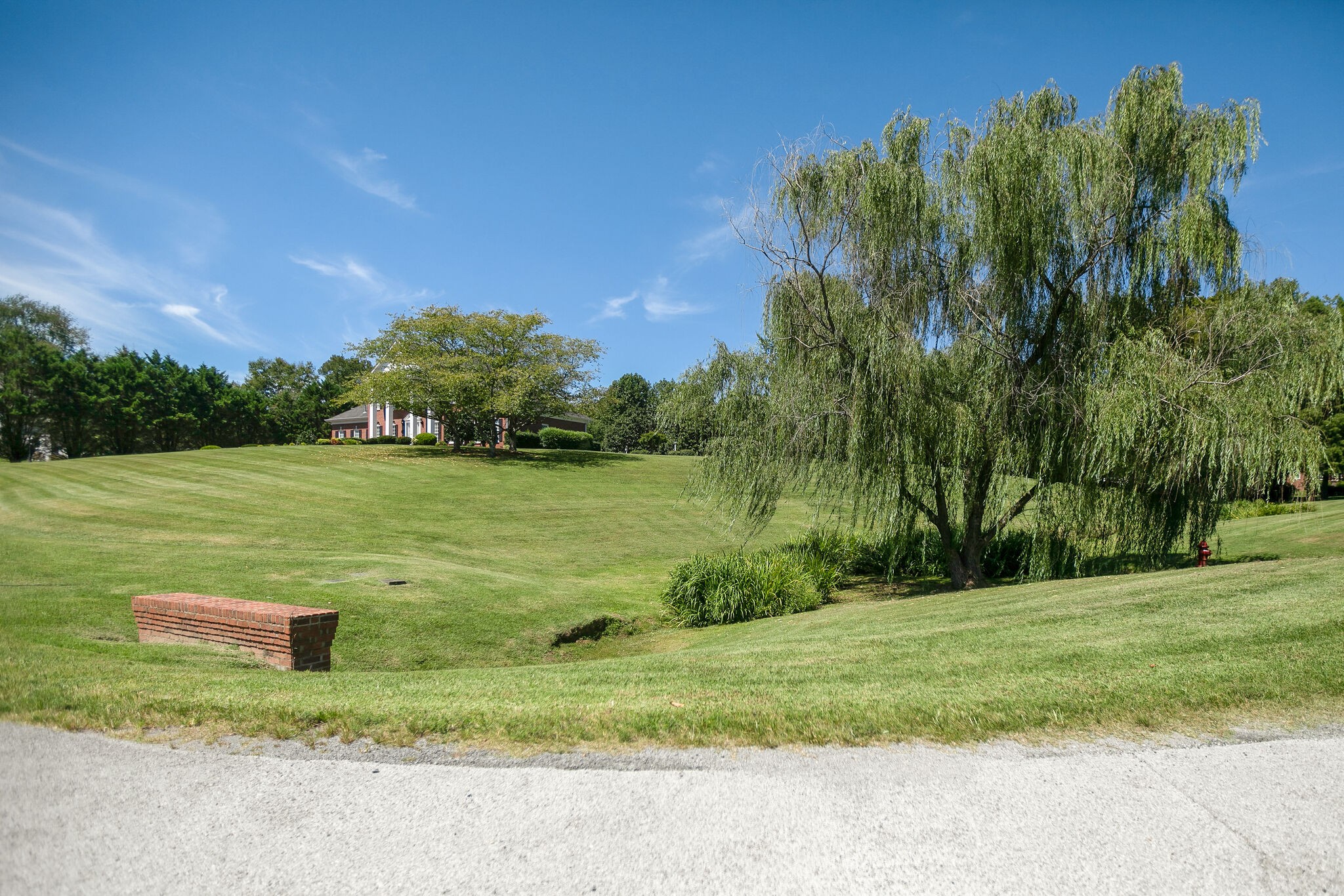 2260 Avery Court Franklin, TN 37067 - Photo 60 of 61 a view of a lake with a house in the background