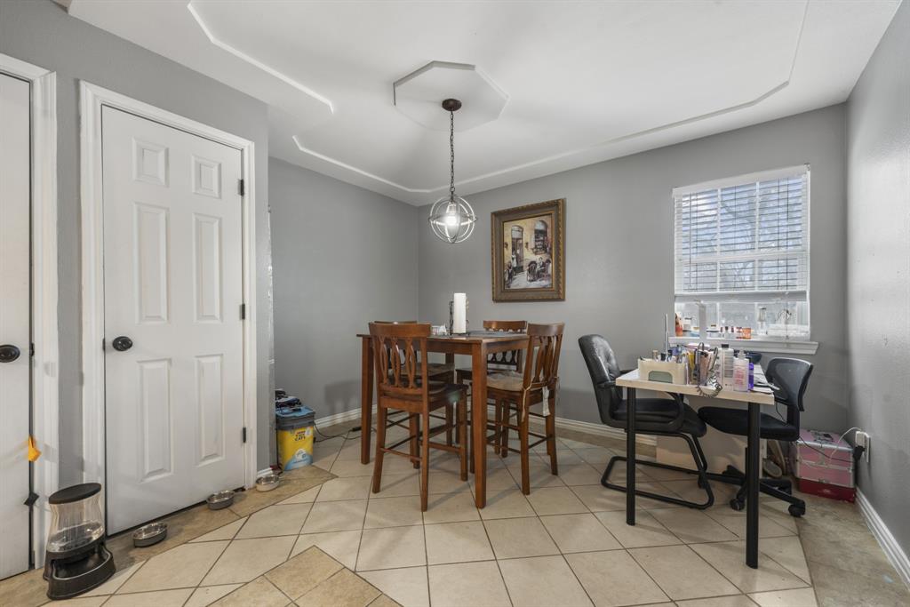 508 North Dick Price Road Kennedale, TX 76060 - Photo 14 of 34 a dining room with furniture and window
