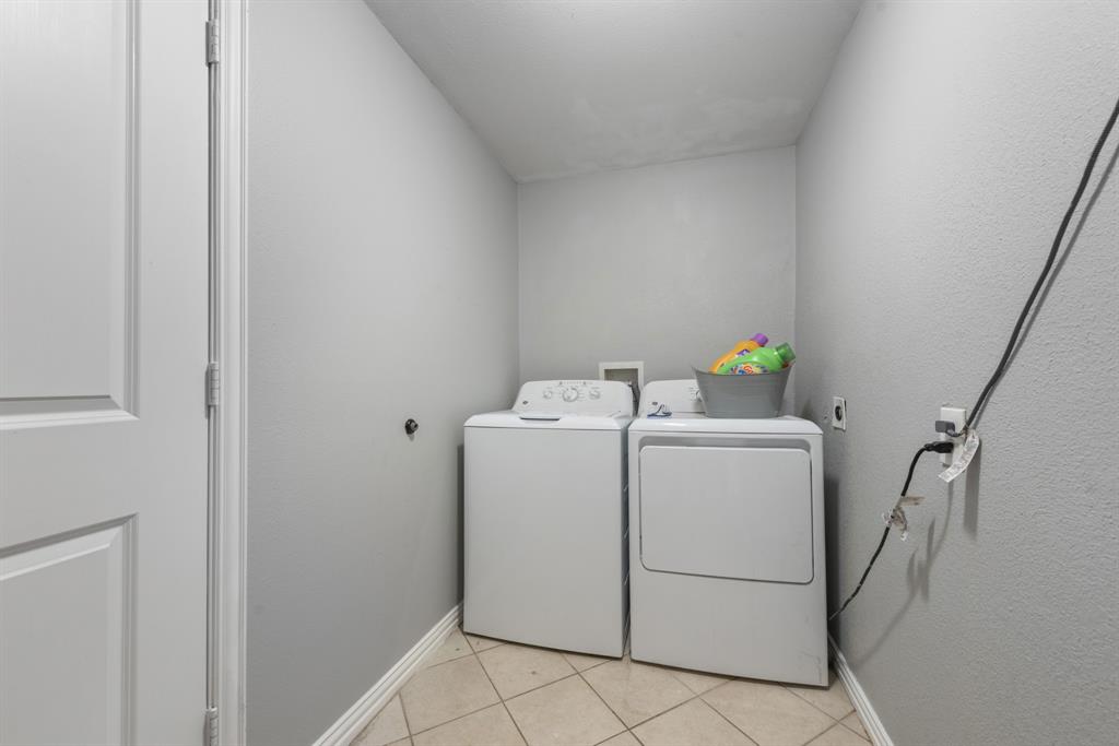 508 North Dick Price Road Kennedale, TX 76060 - Photo 25 of 34 a utility room with dryer and washer