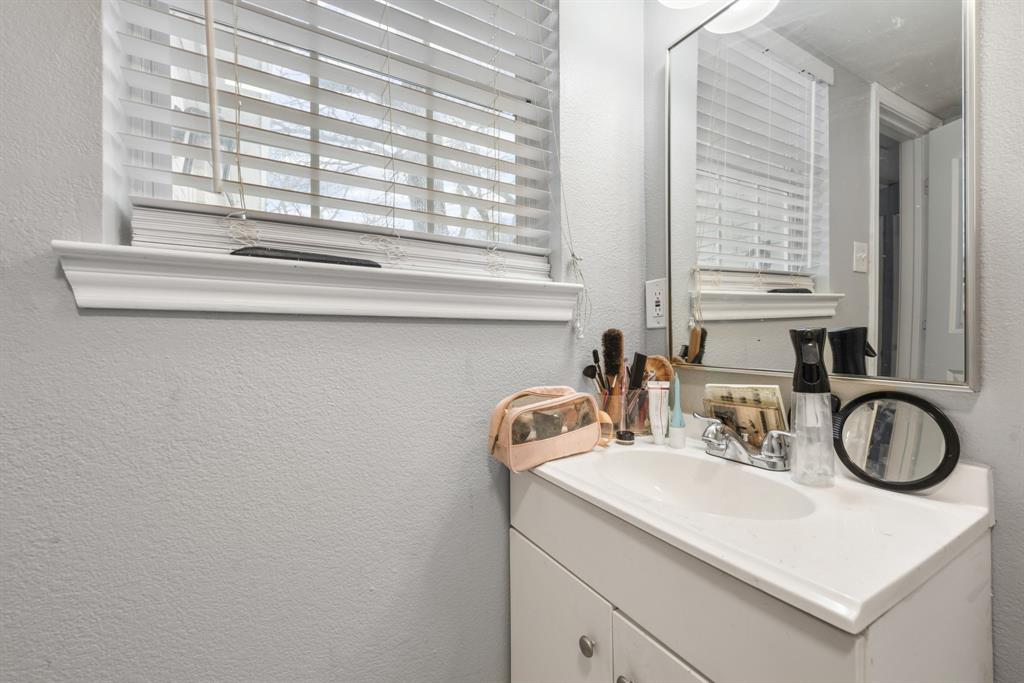 508 North Dick Price Road Kennedale, TX 76060 - Photo 26 of 34 a bathroom with a sink and a window