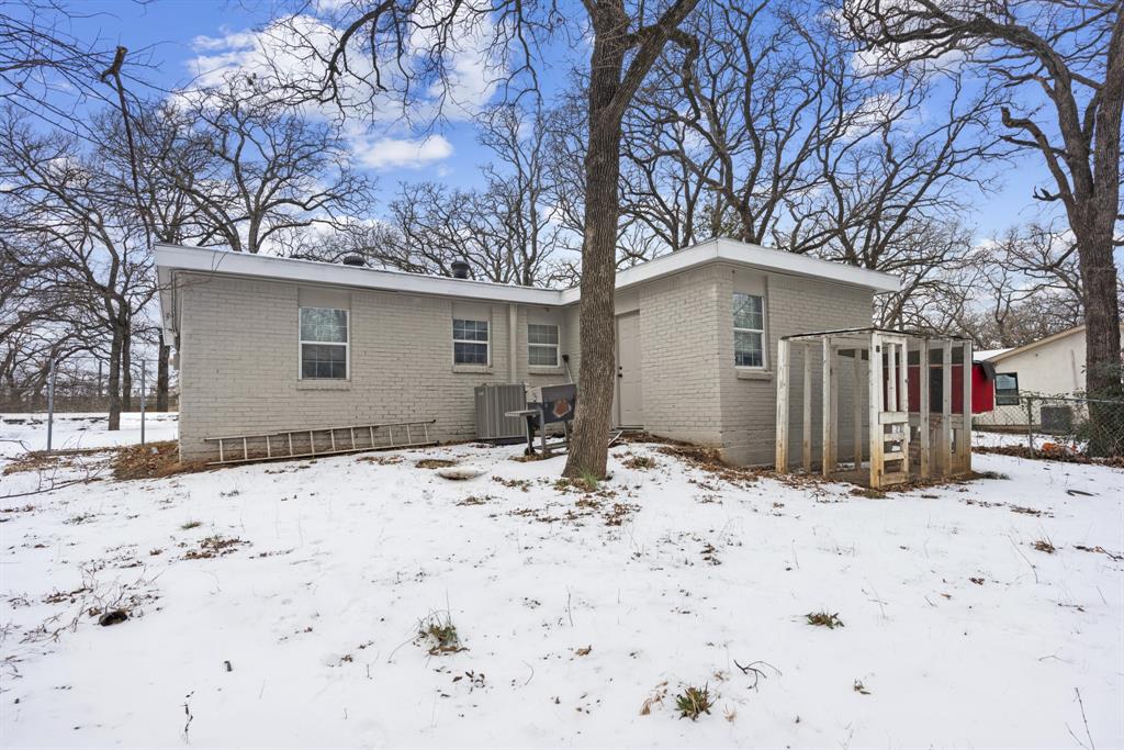 508 North Dick Price Road Kennedale, TX 76060 - Photo 32 of 34 a view of wooden house with snow on the road