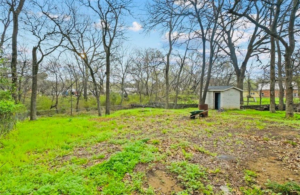 508 North Dick Price Road Kennedale, TX 76060 - Photo 8 of 9 a house with huge green field