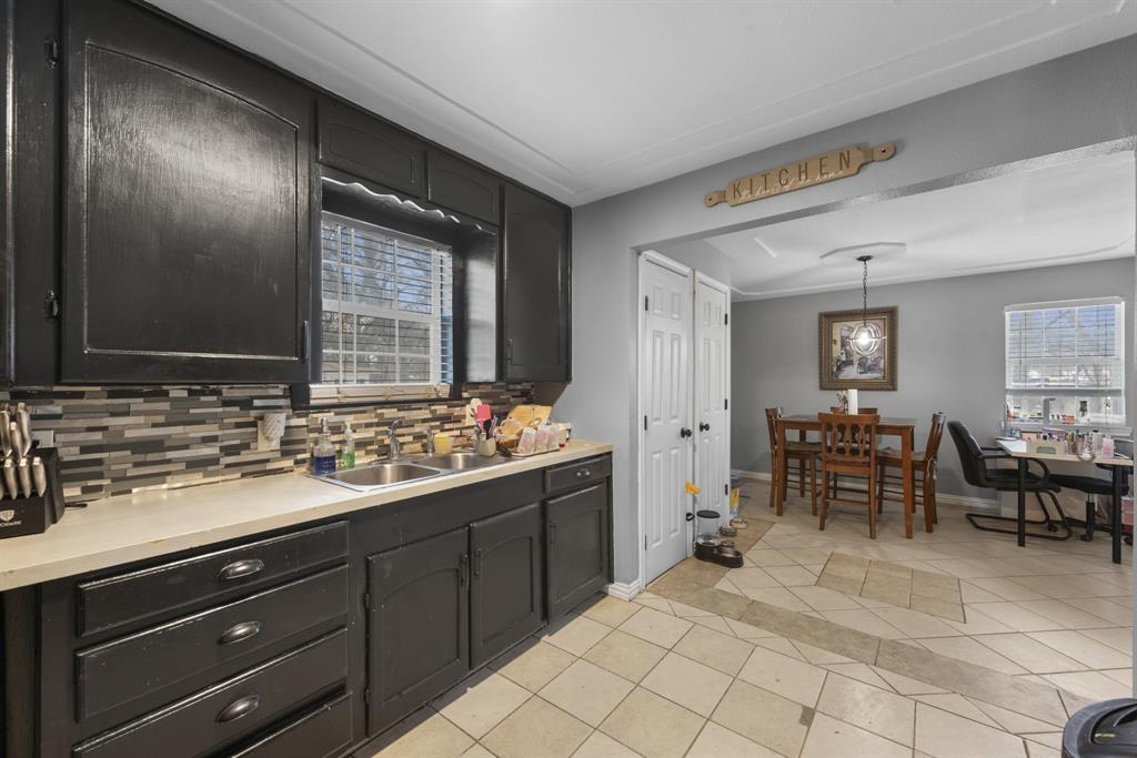 508 North Dick Price Road Kennedale, TX 76060 - Photo 9 of 34 a spacious bathroom with a double vanity sink and a mirror