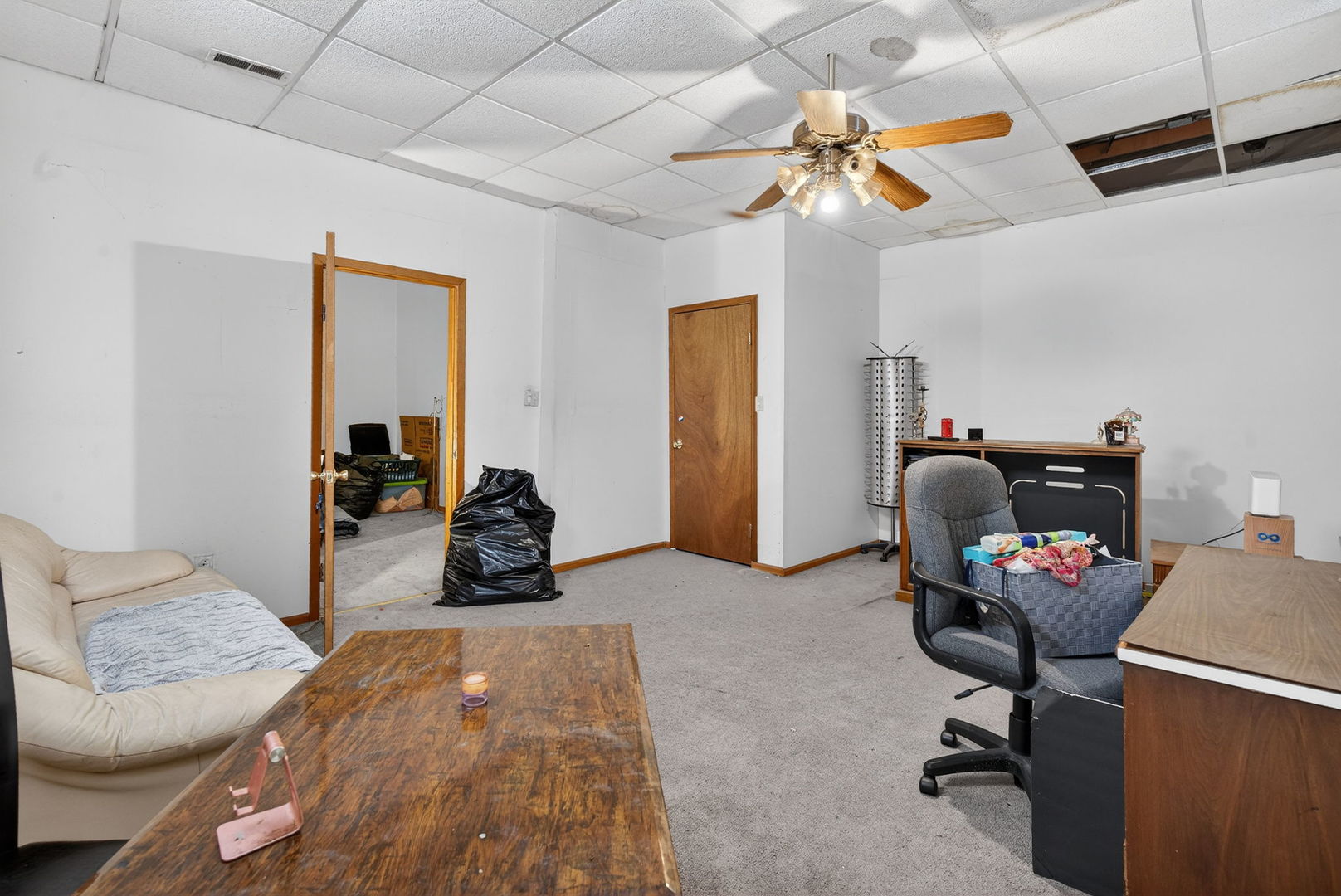 4448 Maple Avenue Matteson, IL 60443 - Photo 23 of 26 a bedroom with bed and a chandelier