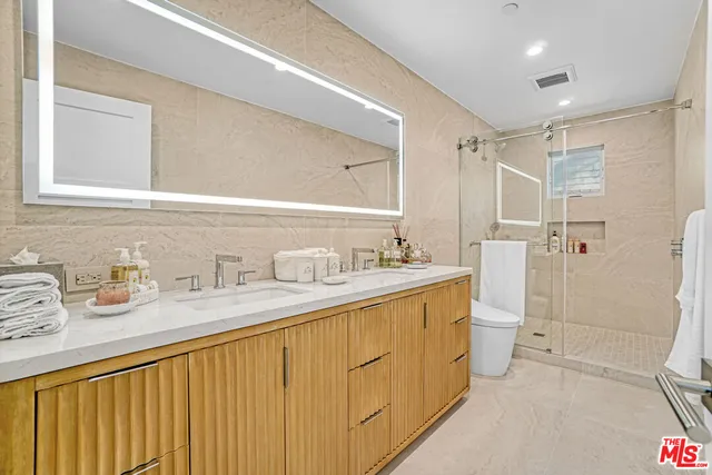 a bathroom with a sink and a window