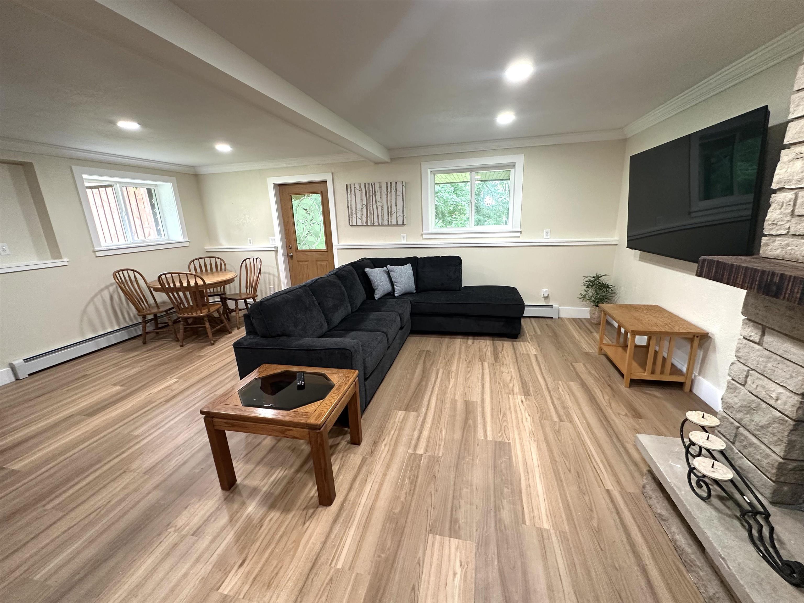 12750 West Cross Road Galena, IL 61036 - Photo 12 of 15 a living room with furniture and a flat screen tv