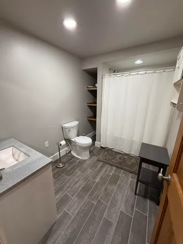 a bathroom with a sink and a toilet