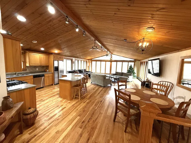 a very nice looking kitchen with a large window