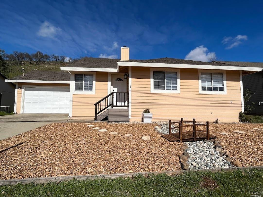 18474 Hidden Valley Road Hidden Valley Lake, CA 95467 - Photo 1 of 1 a view of a house with a yard