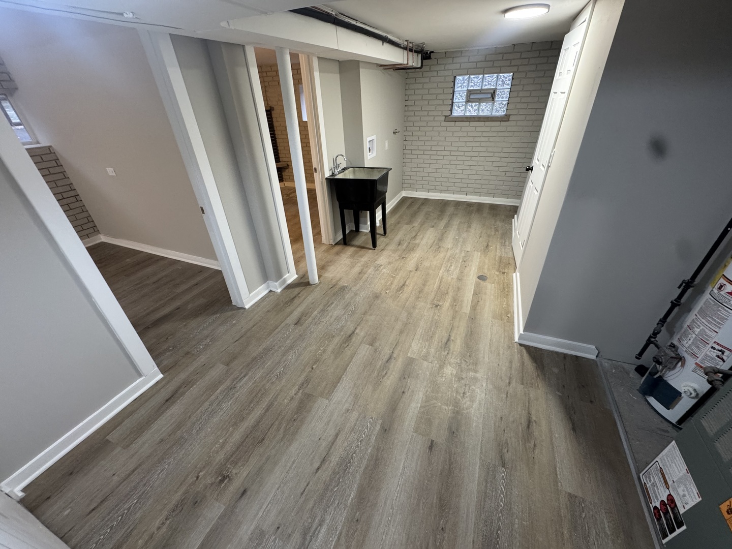 15041 Oak Street Dolton, IL 60419 - Photo 12 of 19 a view of a room with wooden floor and staircase