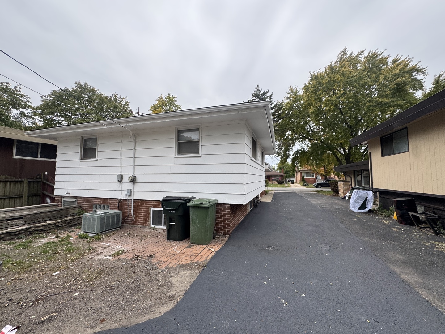 15041 Oak Street Dolton, IL 60419 - Photo 18 of 19 a view of a house with a patio