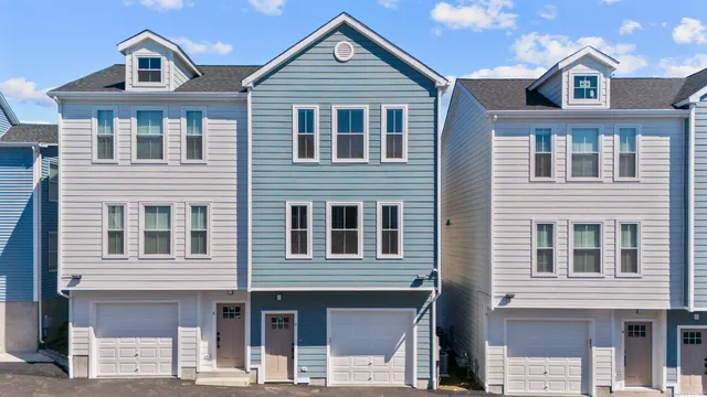 a front view of a house with balcony