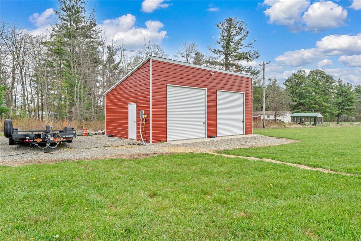 9651 Bent Mountain Road Bent Mountain, VA 24059 - Photo 38 of 71 a view of a house with backyard porch and sitting area