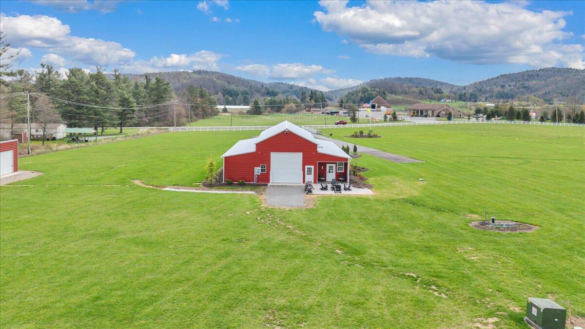 9651 Bent Mountain Road Bent Mountain, VA 24059 - Photo 48 of 71 a view of green field with house in the background