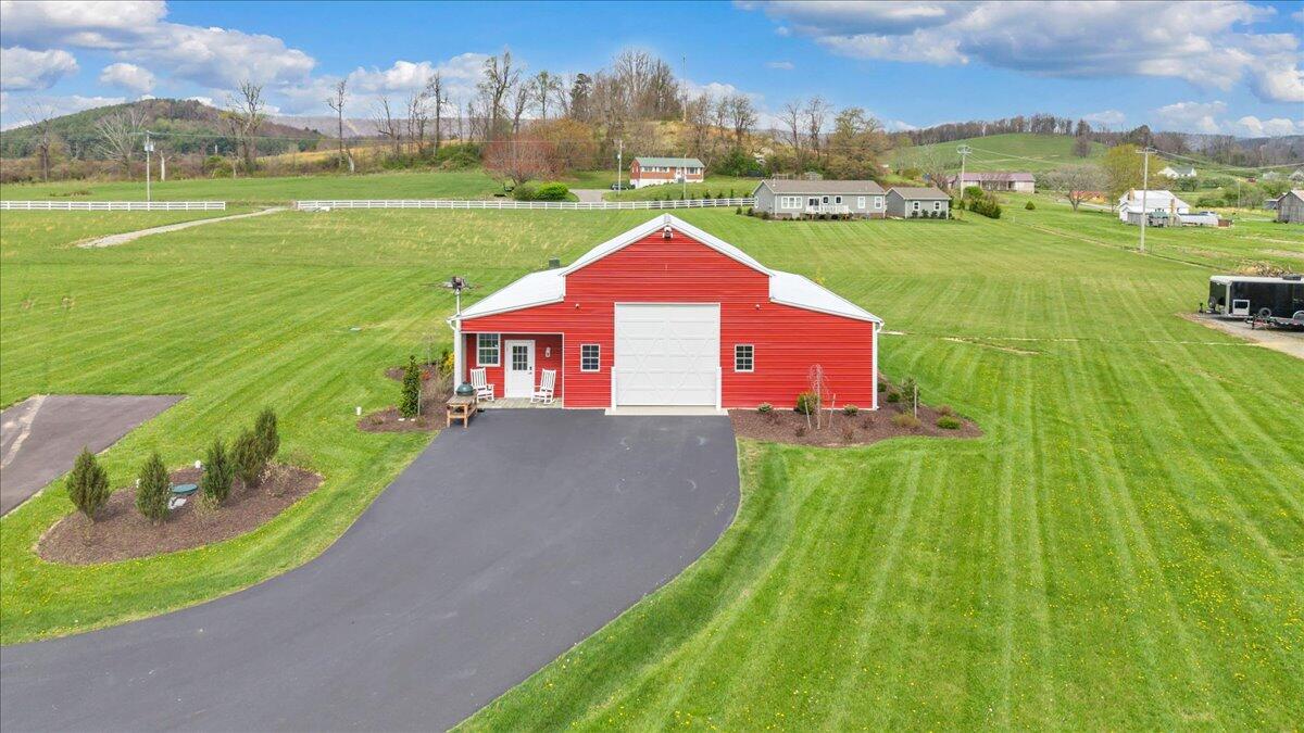 9651 Bent Mountain Road Bent Mountain, VA 24059 - Photo 65 of 71 a view of a big yard with table and chairs