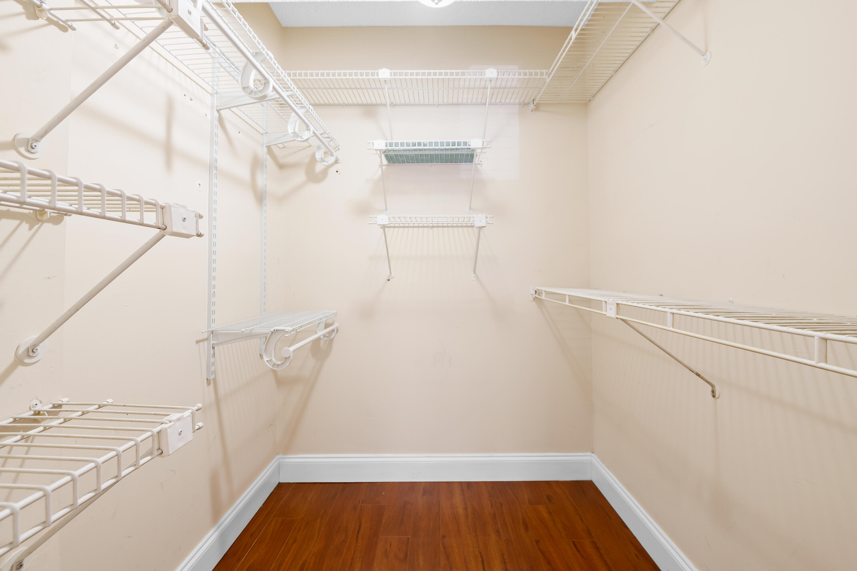 4156 Inverrary Drive, Unit 210 Lauderhill, FL 33319 - Photo 13 of 27 a view of walk in closet with empty racks