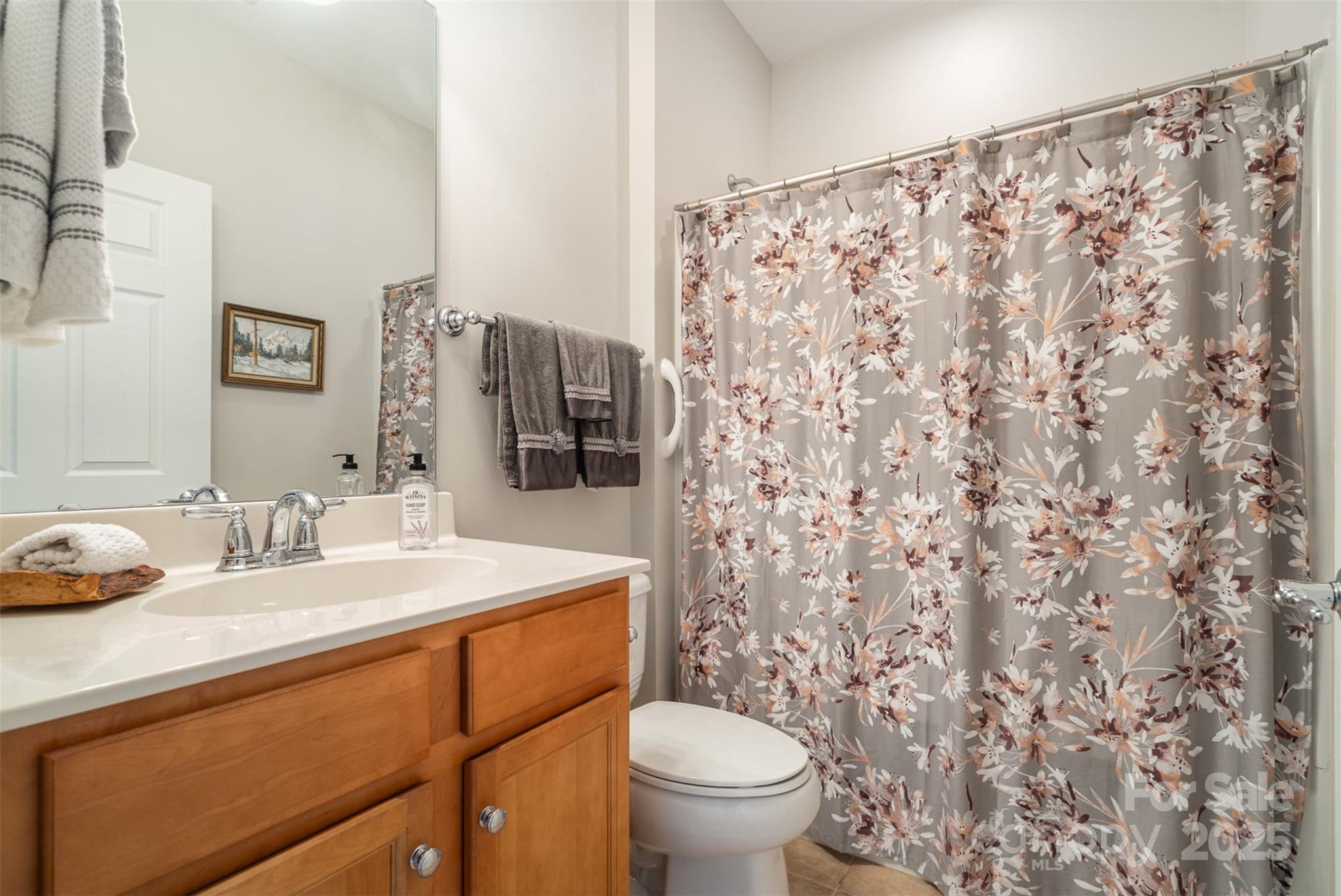 4079 Murray Street Fort Mill, SC 29707 - Photo 16 of 38 a bathroom with a sink toilet and shower