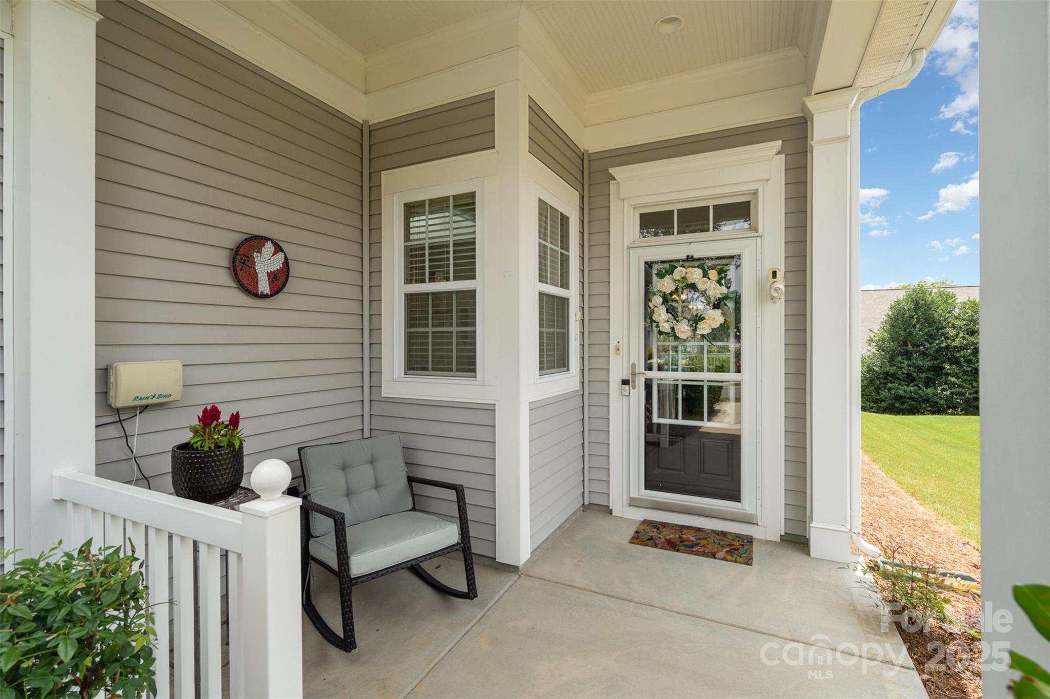 4079 Murray Street Fort Mill, SC 29707 - Photo 3 of 38 a view of porch with two chair and a potted plant