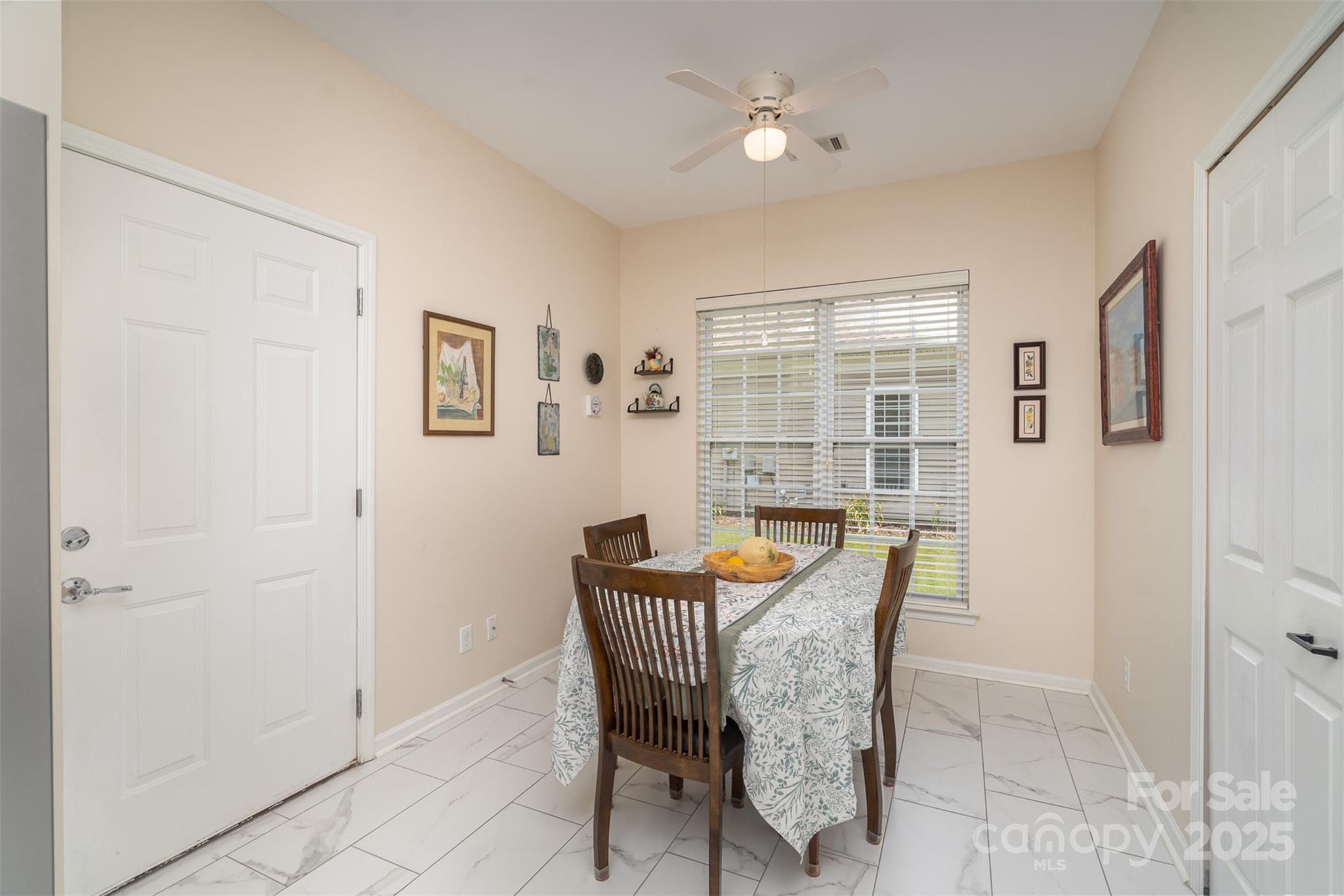 4079 Murray Street Fort Mill, SC 29707 - Photo 10 of 38 a dining room with furniture and front door