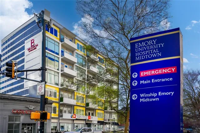 a sign on a pole on a street