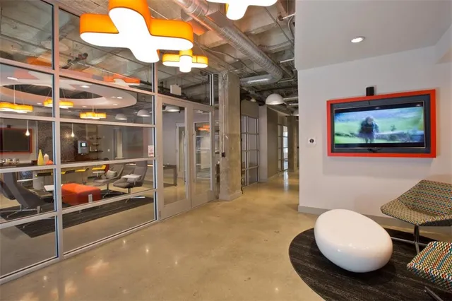 a view of a livingroom with furniture and window