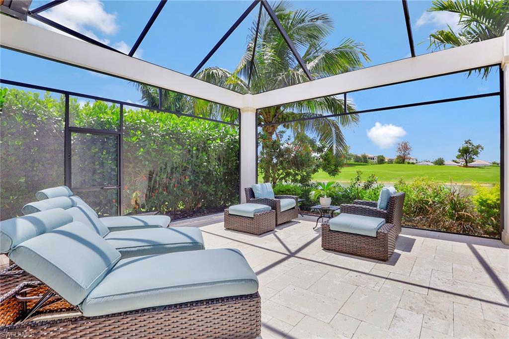 16434 Seneca Way Naples, FL 34110 - Photo 27 of 35 a outdoor living space with furniture and garden view