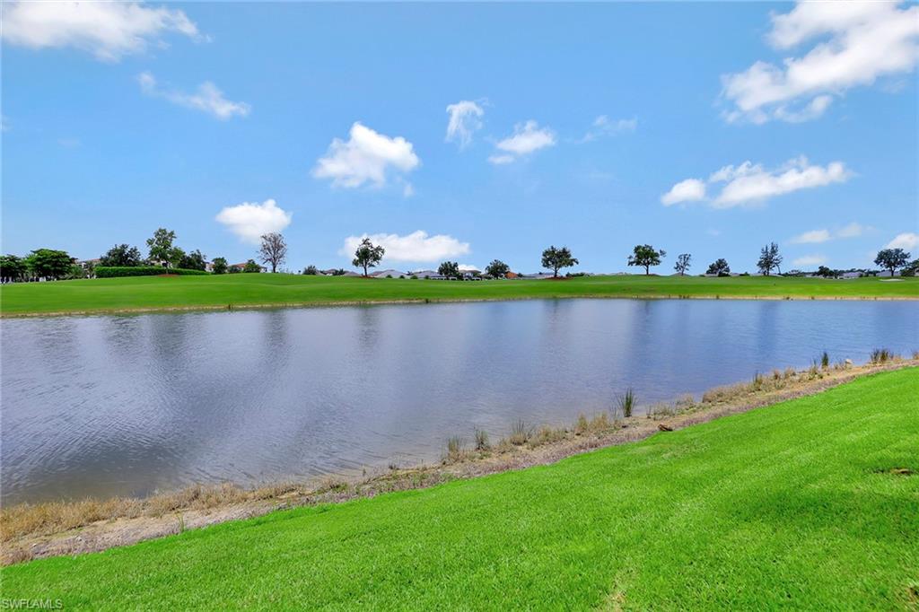 16434 Seneca Way Naples, FL 34110 - Photo 35 of 35 a view of a lake and outdoor space