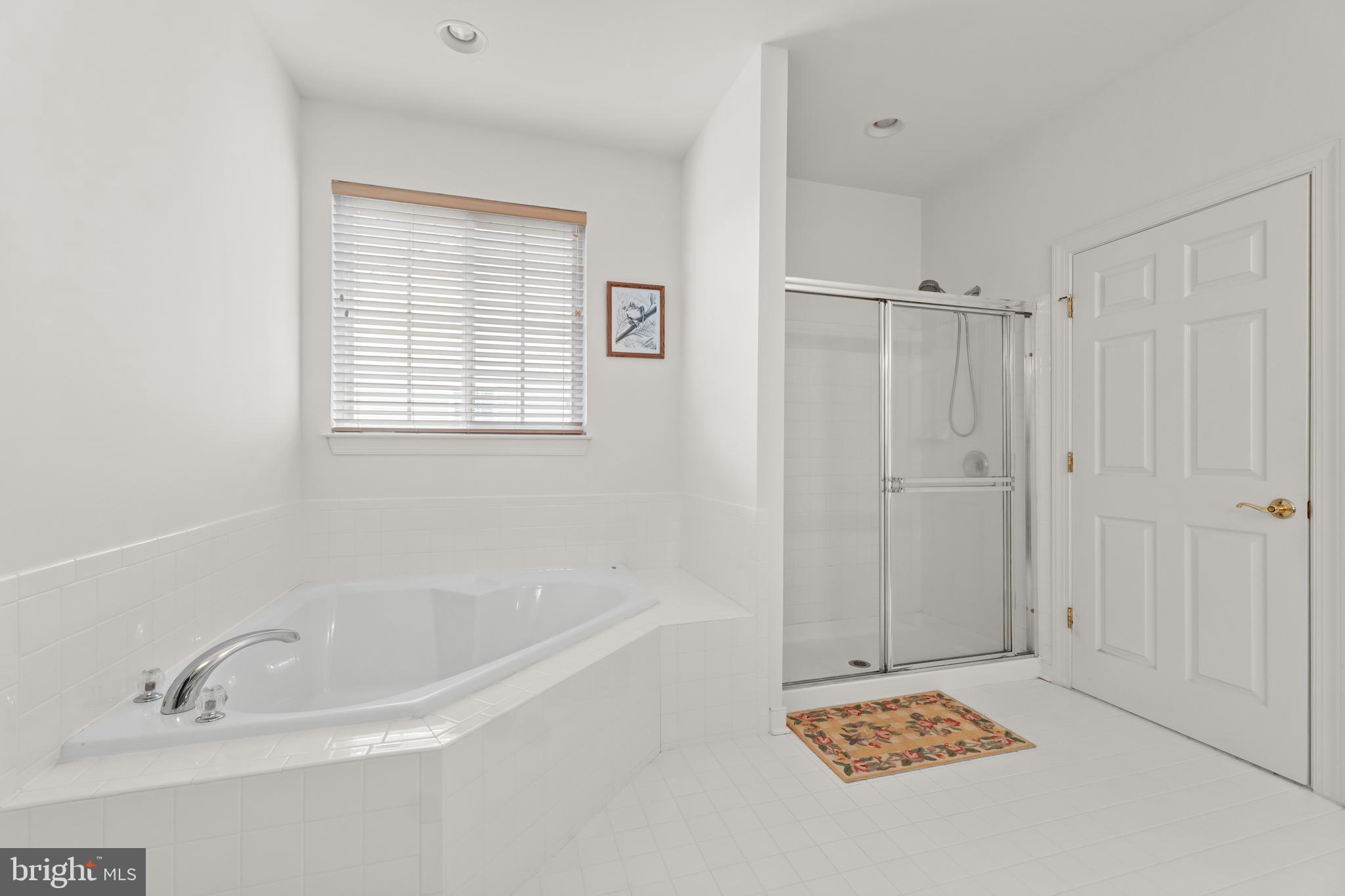 5 St George Ocean View, DE 19970 - Photo 19 of 29 a bathroom with a bathtub and shower