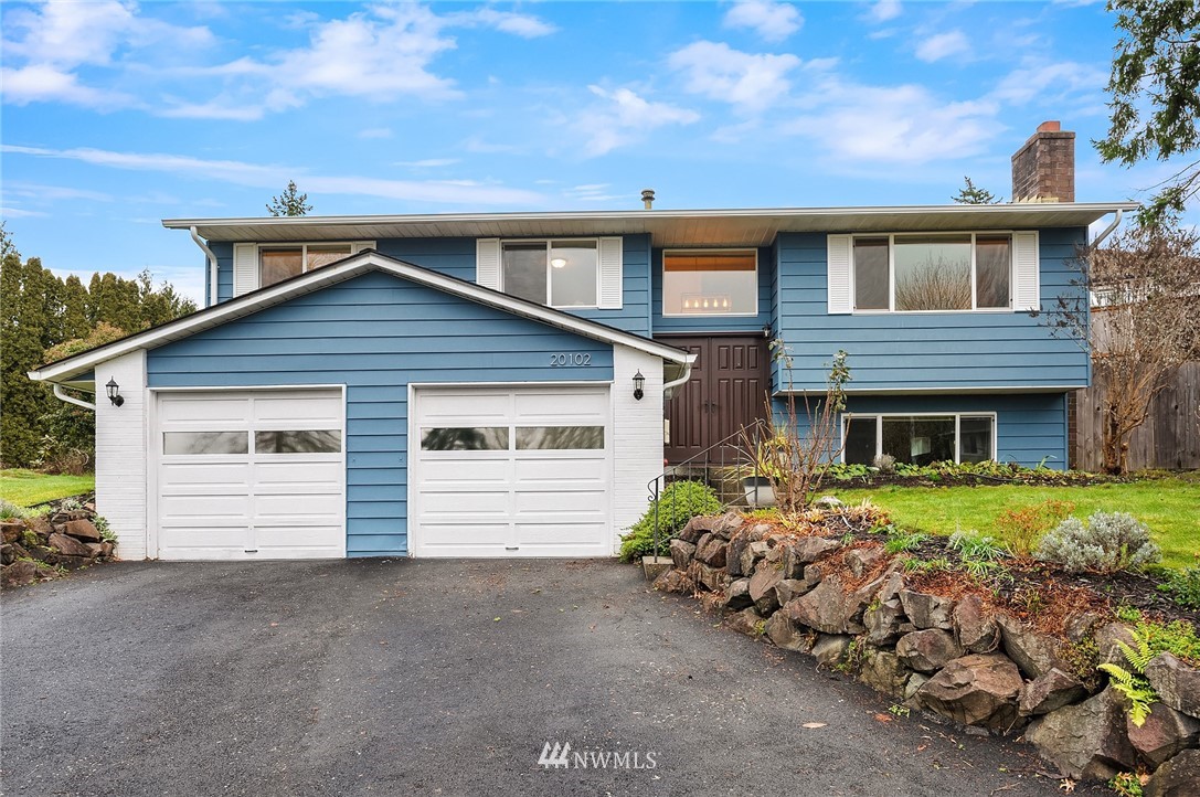 20102 103rd Place Northeast Bothell, WA 98011 - Photo 21 of 22 a view of a house with a yard
