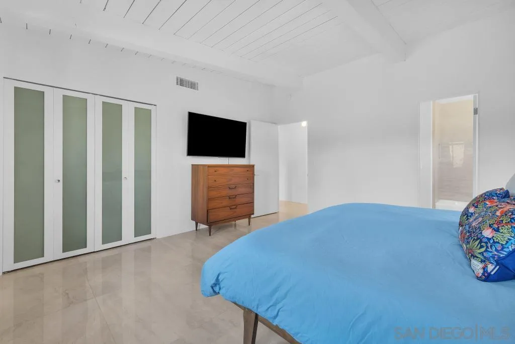 1606 Yaqui Road Borrego Springs, CA 92004 - Photo 26 of 51 a bedroom with a bed and a television in it