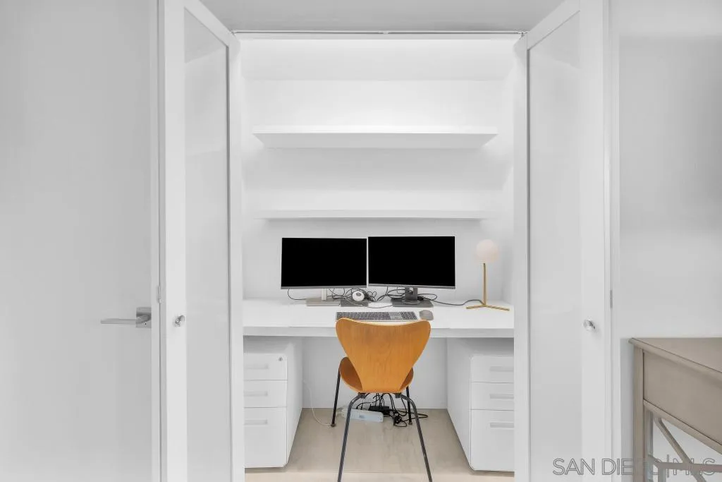1606 Yaqui Road Borrego Springs, CA 92004 - Photo 29 of 51 a view of a workspace with furniture and white wall