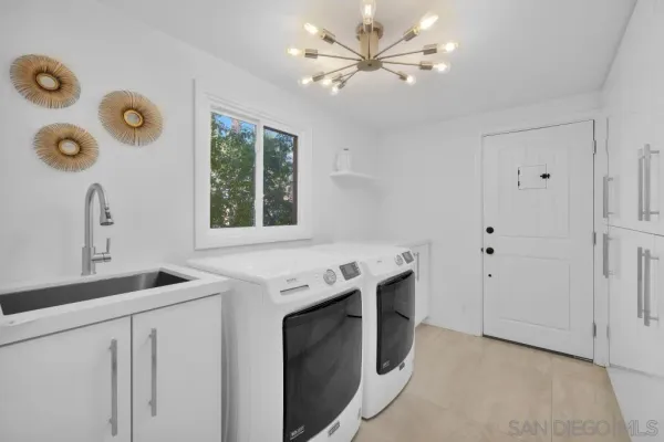 a house with swimming pool in front of it