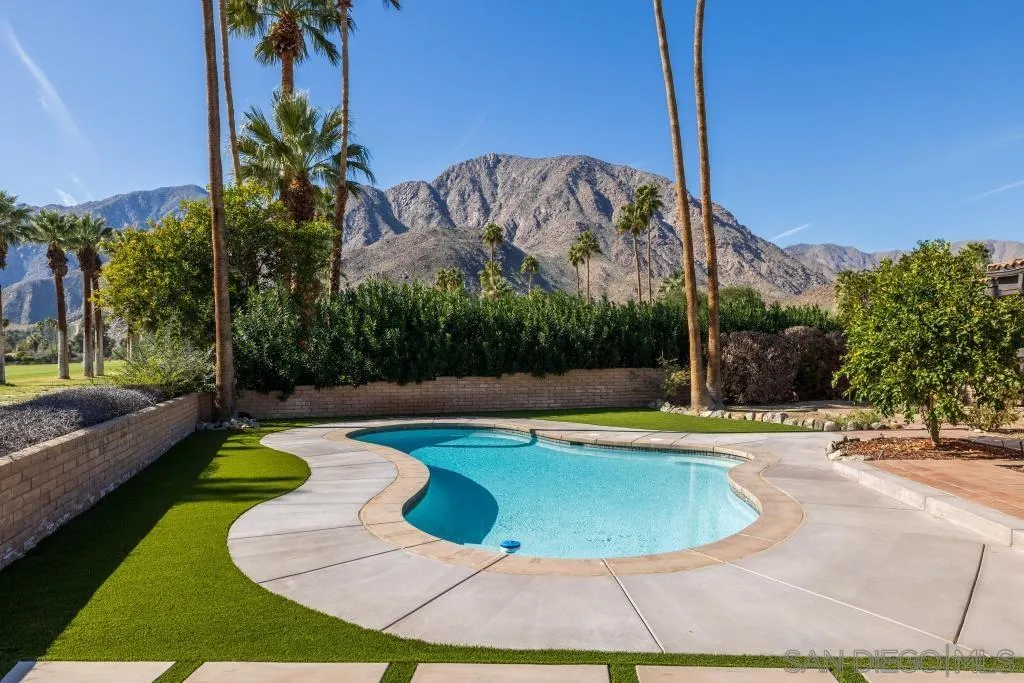 1606 Yaqui Road Borrego Springs, CA 92004 - Photo 36 of 51 a view of a swimming pool with a yard