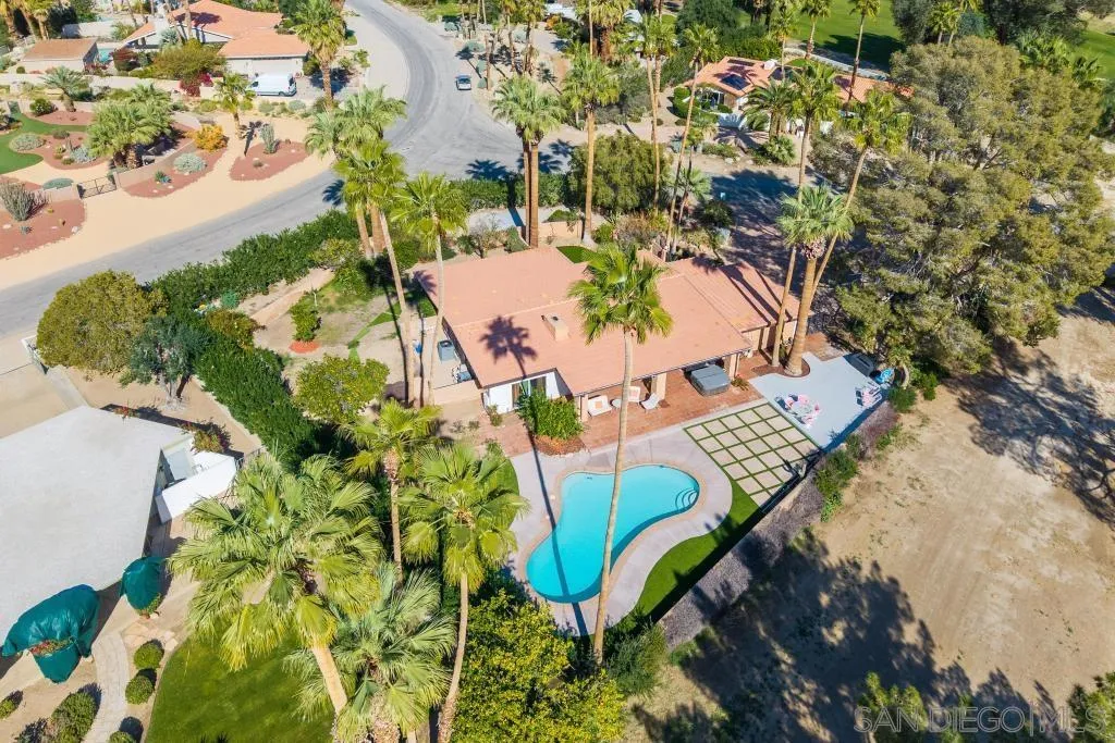 1606 Yaqui Road Borrego Springs, CA 92004 - Photo 43 of 51 an aerial view of a house a garden and swimming pool