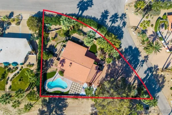 a room with pool table and a table