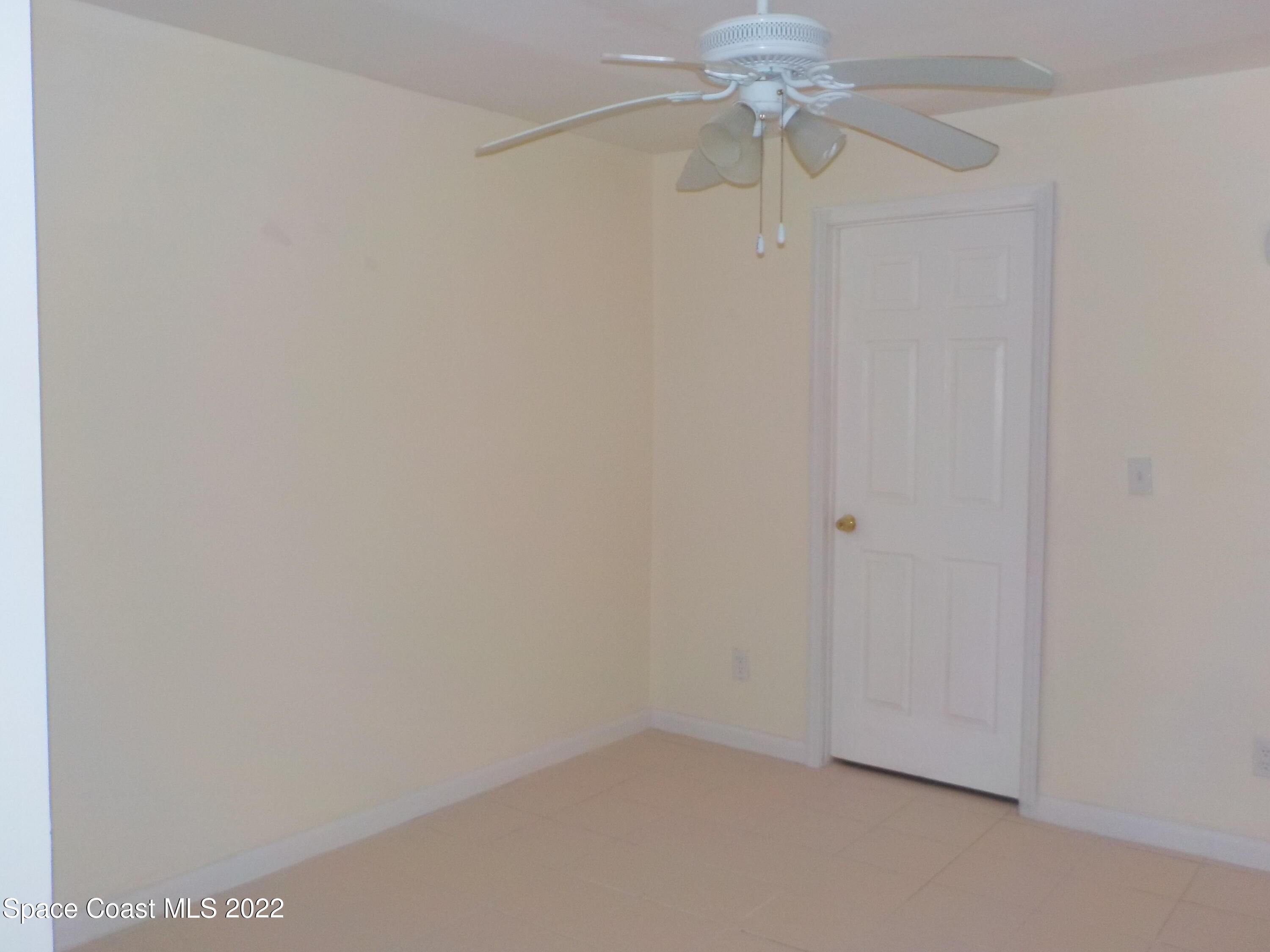 3218 Vista Oaks Circle Northeast Palm Bay, FL 32905 - Photo 4 of 11 a view of a small space