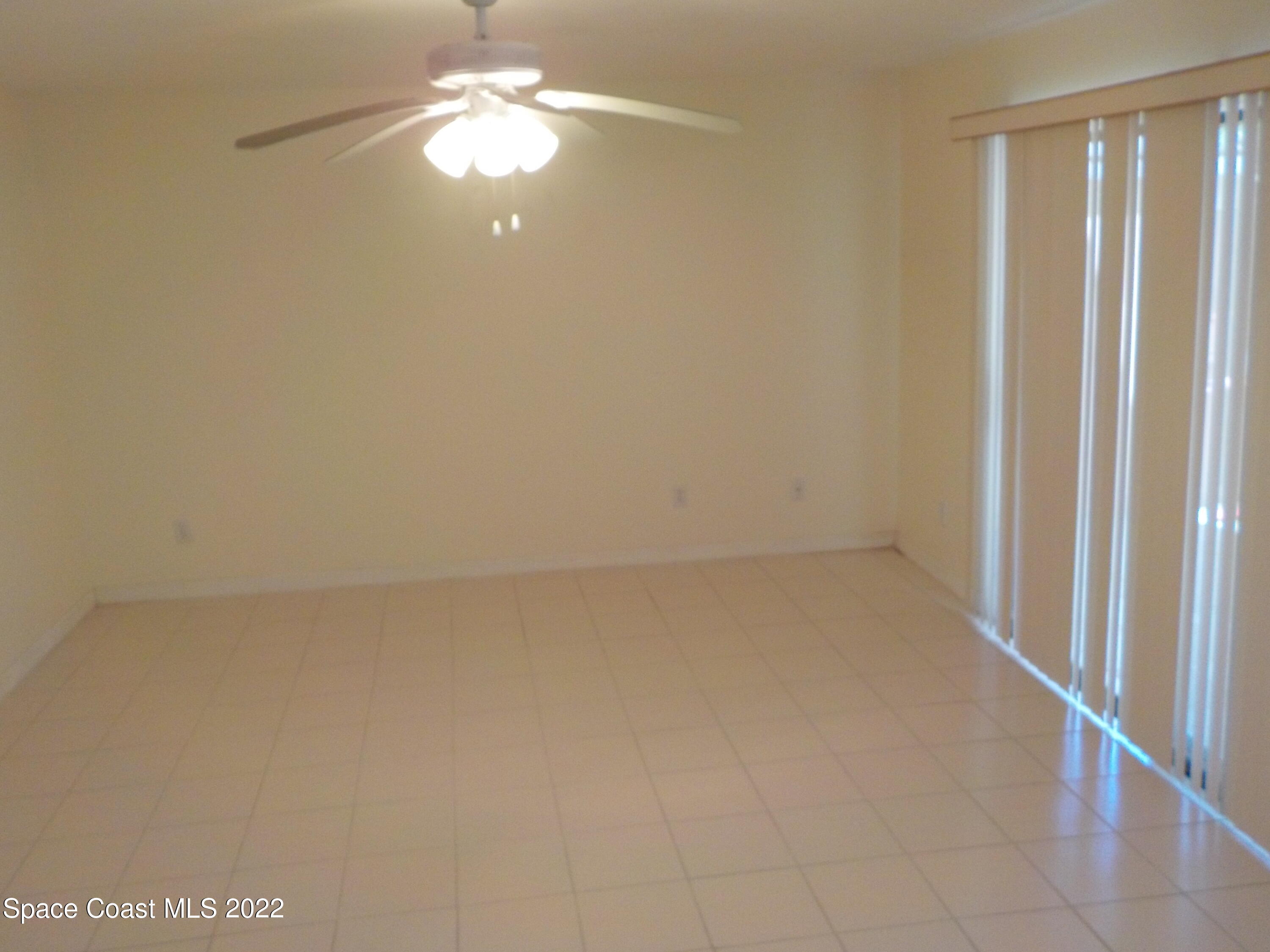 3218 Vista Oaks Circle Northeast Palm Bay, FL 32905 - Photo 5 of 11 a view of an empty room