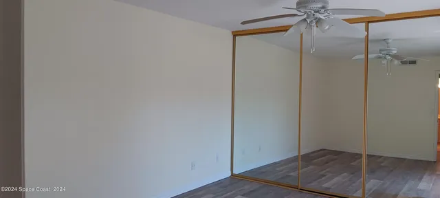 a view of room with hardwood floor