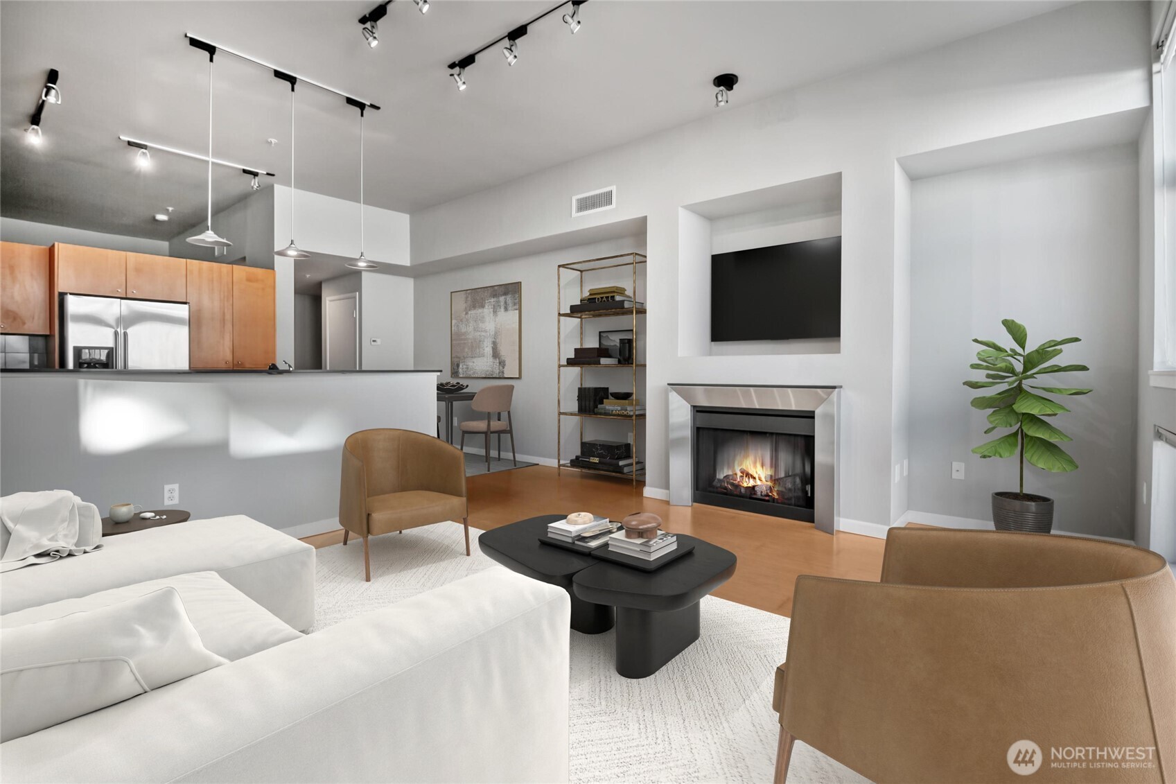 17 West Mercer Street, Unit 217 Seattle, WA 98119 - Photo 2 of 36 a living room with furniture a flat screen tv and a fireplace