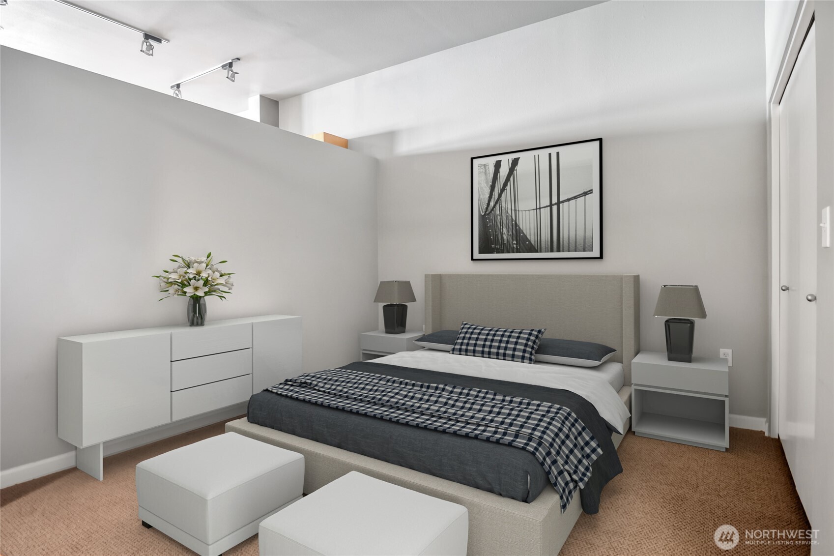 17 West Mercer Street, Unit 217 Seattle, WA 98119 - Photo 21 of 36 a bedroom with a bed and furniture