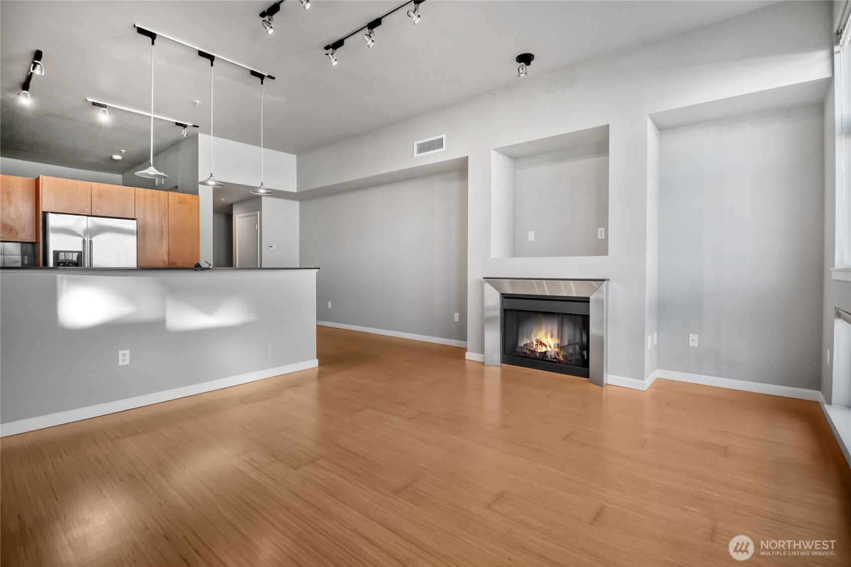 17 West Mercer Street, Unit 217 Seattle, WA 98119 - Photo 3 of 36 a view of a livingroom with a fireplace