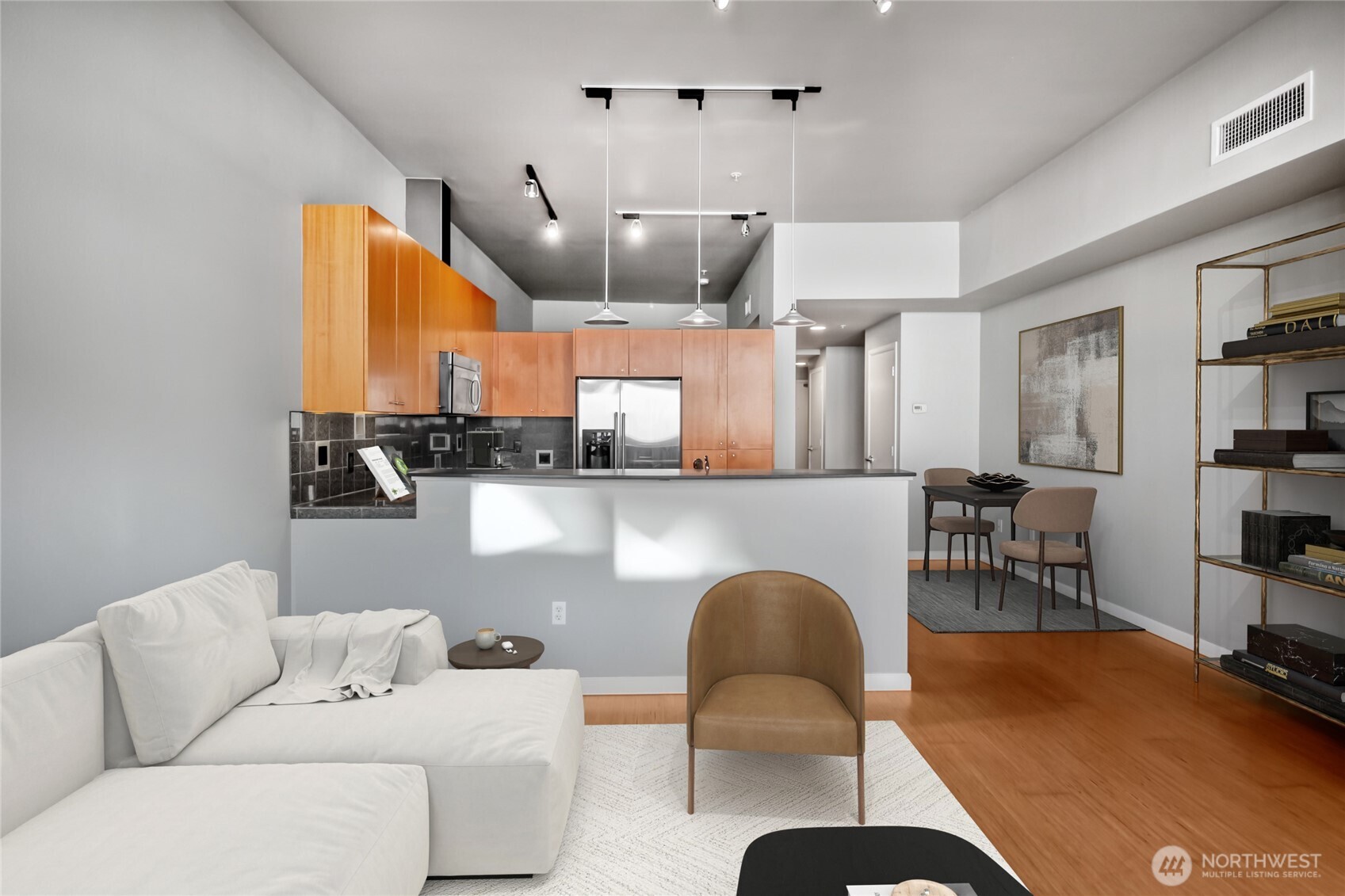 17 West Mercer Street, Unit 217 Seattle, WA 98119 - Photo 10 of 36 a living room with furniture and a large window